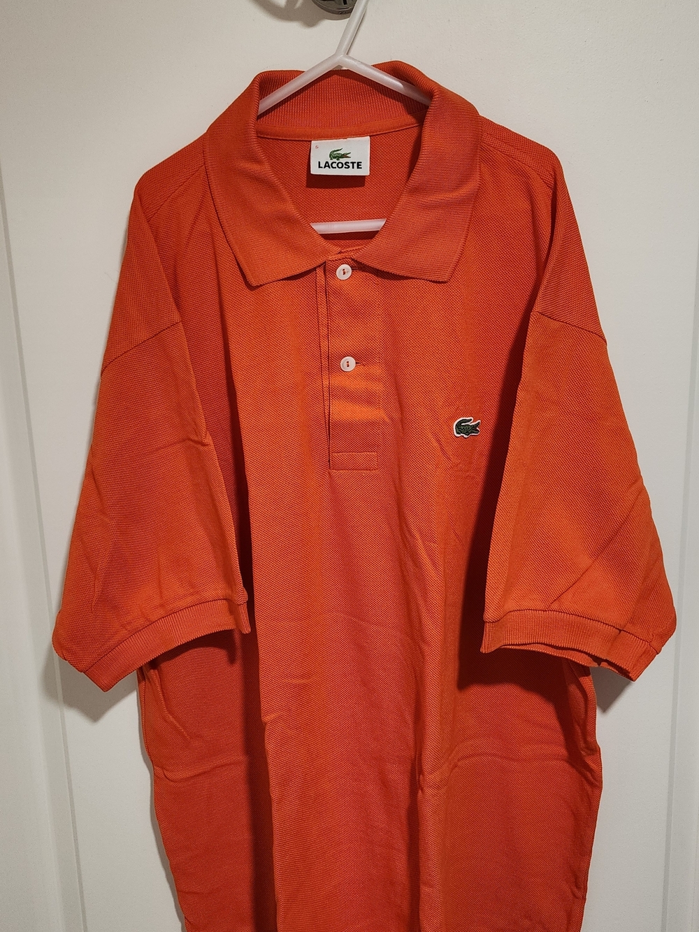 Lacoste Men's Orange Polo with Green Crocodile Emblem